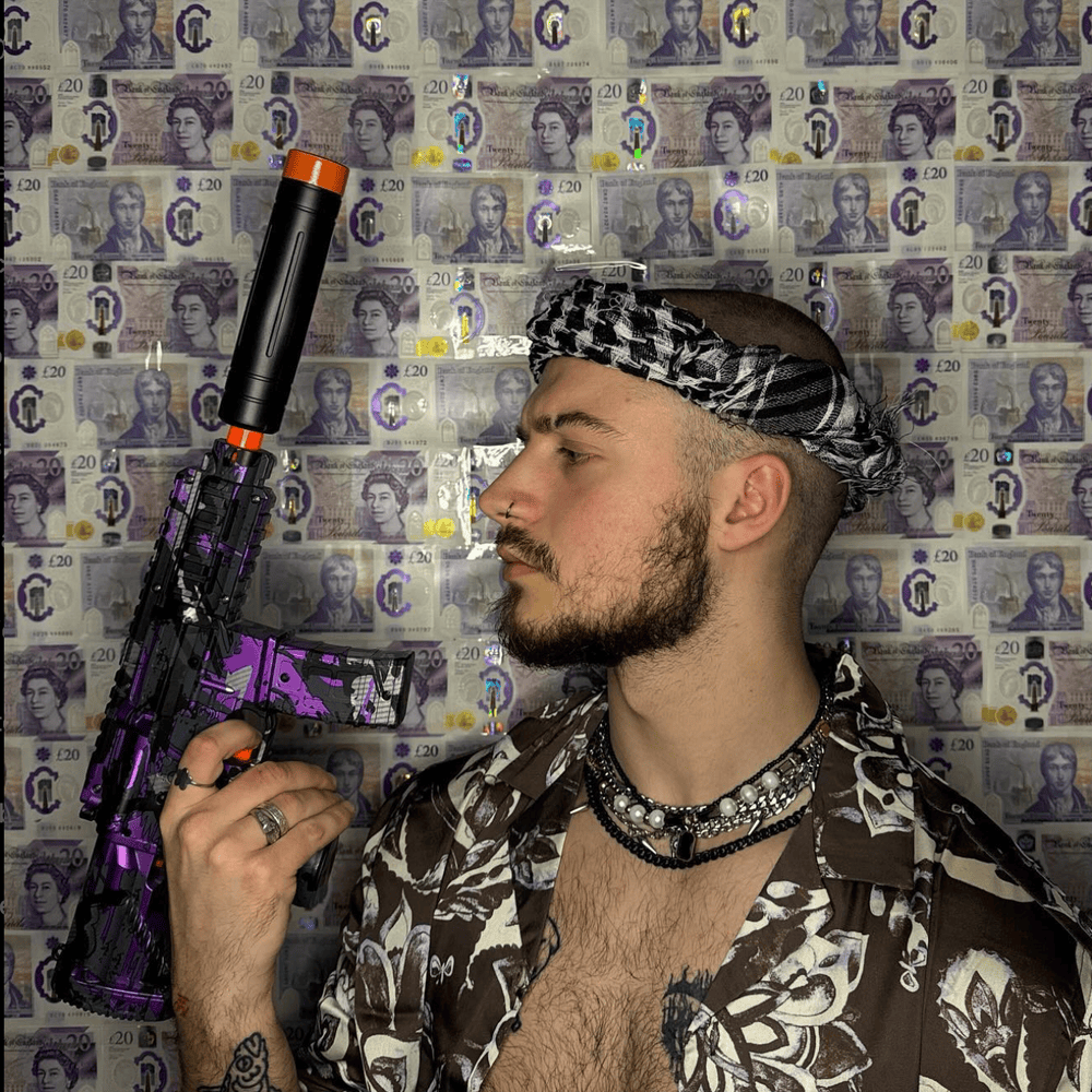Oopsy in a patterned shirt against a banknote backdrop